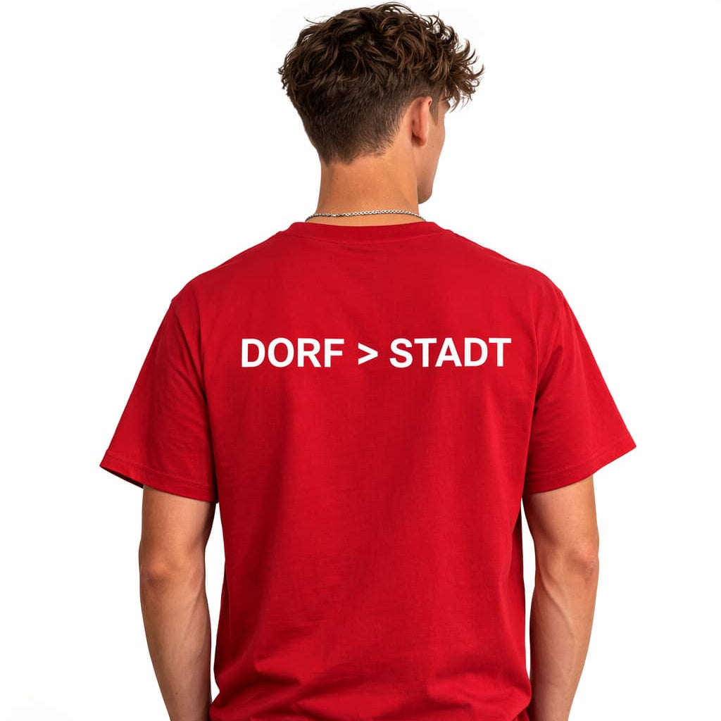 Oversized rotes T-Shirt "Dorf>Stadt" für Damen und Herren - Streetwear-Style.